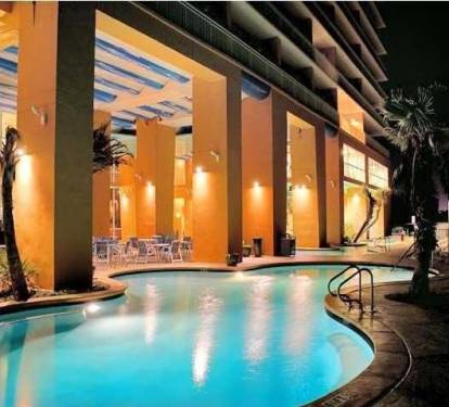 Heated pools illuminated after dark