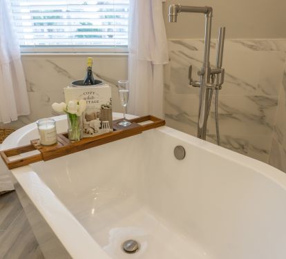 Relax in the tub with your favorite beverage, you deserve it !  
