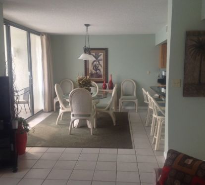 Seating for 6 at the dining table with 3 additional at the kitchen bar.