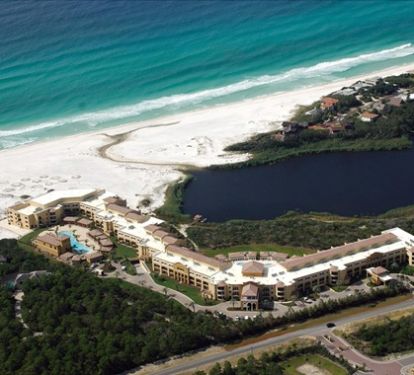 Aerial view of complex. 23 beautiful acres overlooking Gulf of Mexico and Big Redfish Lake.