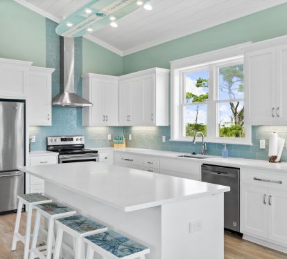 Kitchen loaded with amenities and our Surf Board island lighting!