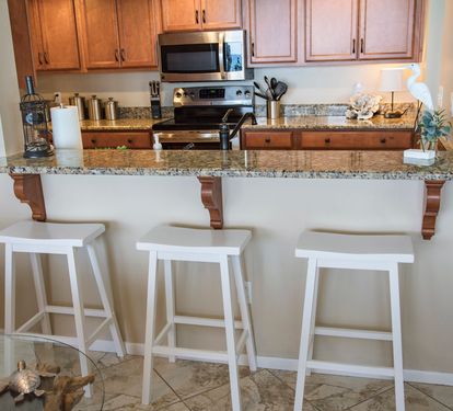 Bar area with 3 bar stools great for the kids!