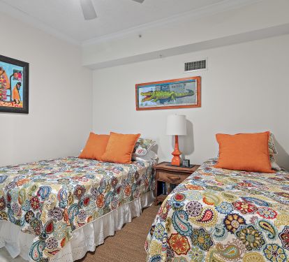 Third Bedroom With A Queen Bed, Twin Bed and Local Art