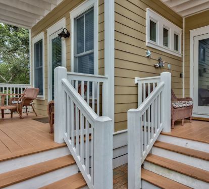 Front entry to the right, relaxing deck to the left.