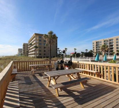 Picnic tables near the grills make outdoor dining easy