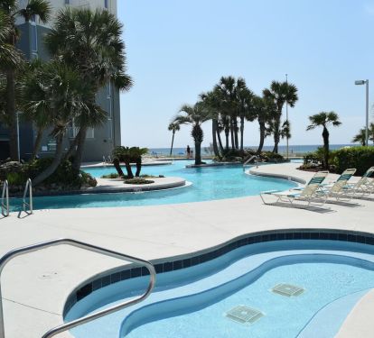 Lagoon Pool With 2 Palm Tree Islands &amp; Water Falls. Plus large Jacuzzi.