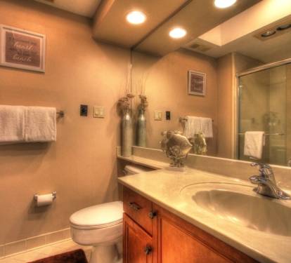 Guest bath, also washer/dryer located