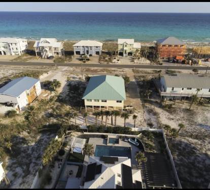Aerial View of House with the Gulf of Mexico within 500 ft walking distance