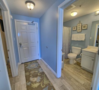 Entry with access to guest bedroom and bath.