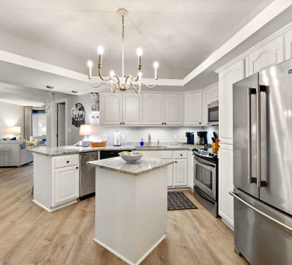 Updated and fully stocked kitchen including a high capacity ice maker