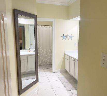 YELLOW GUEST BATHROOM WITH LINEN CLOSET &amp; WALK IN CLOSET 