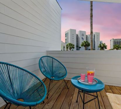 Step onto your second-floor balcony and take in tranquil lake views from the comfort of your own space. Whether it&rsquo;s sunrise coffee or stargazing at night, this peaceful perch is the perfect way to bookend your beach days. ðŸ›â˜•âœ¨