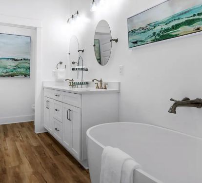 Windsong-20 Bedroom 1 bath, pic 1. 1st floor. King with private bath. Freestanding tub, full walk-in shower, double quartz vanity.