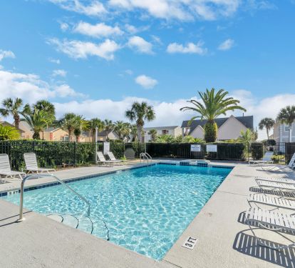 Community pool is located directly out the front door!