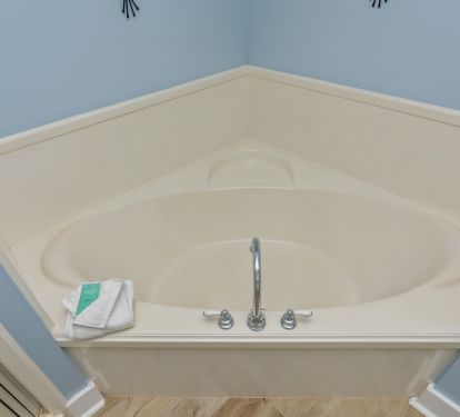 Unwind from a day at the beach in the soothing soaker garden tub