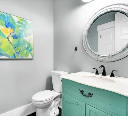 Freestyle-17 First floor half bath. Every bath in Freestyle features a funky funky color "pop". It's all about "summoning your happy".