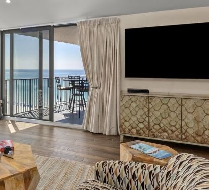 Large Smart TV and comfortable swivel chairs, sofa.