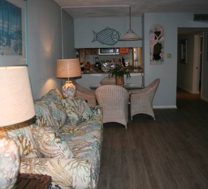 Living room with beach view, new floor and furnishings