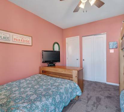 Freshly painted, this bunk room offers a fresh and comfortable place to sleep