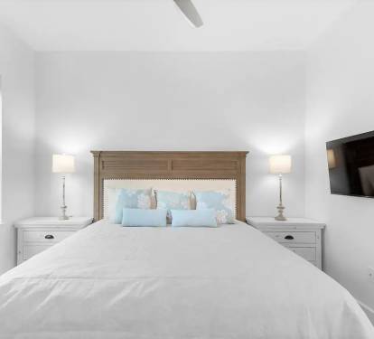 Bliss-23 1st Floor. Bedroom 2. Picture 1. King suite with private full bath with tub/shower combo. This first floor bedroom enables those with mobility challenges to easily participate in the making of the family's new memories.
