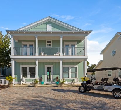 Front porch with large  parking area. Golf cart available for rent