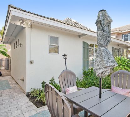 Additional view of backyard seating area.