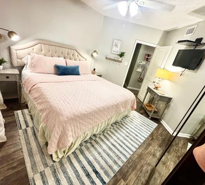 Another cozy king bed in the guest bedroom