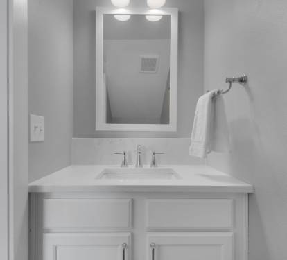 Half bathroom off of living room.