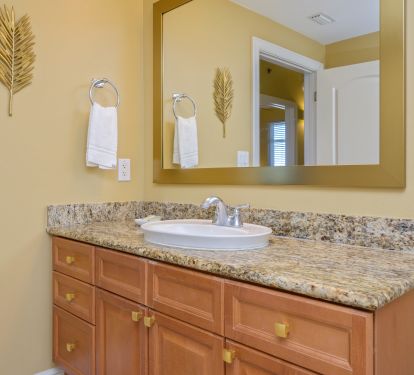 The secondary bathrooms each have a tub-shower combo with lots of storage