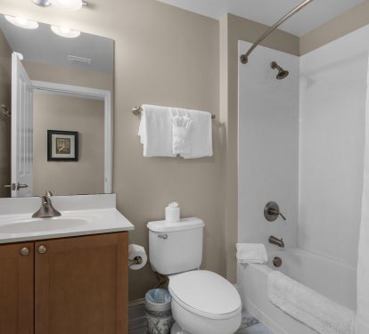 Hallway common bathroom near entryway.