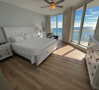 Luxurious master suite with endless water views and a large master bath.