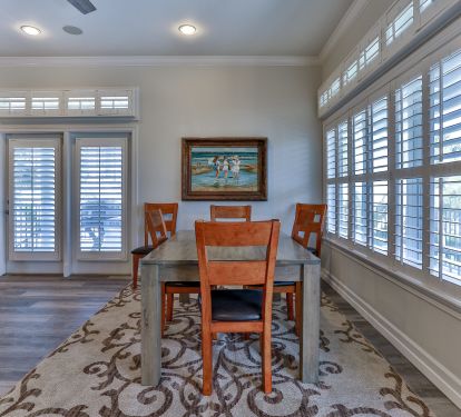 Second dining area off of living room with view of lake