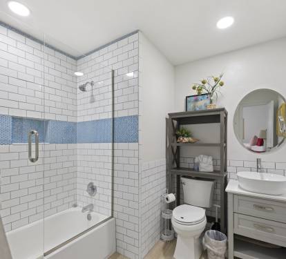 Master bathroom with tub and shower