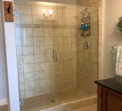 Huge Tiled Shower and Double Vanities with Granite Tops