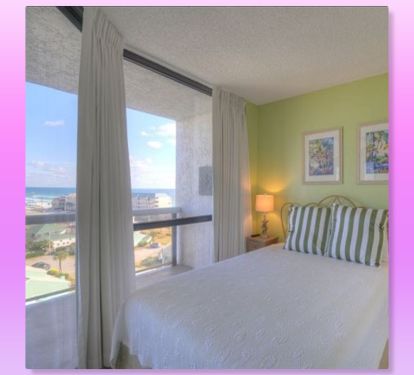 The adorable 2nd bedroom features a full sized bed and great views!