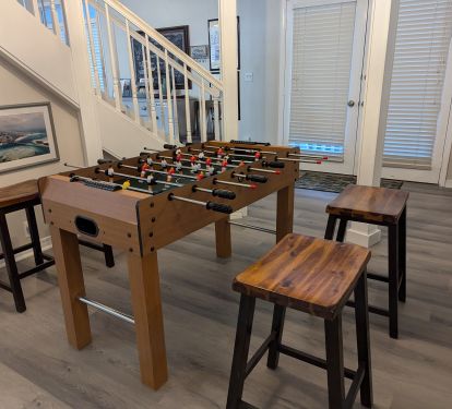 Play foosball in the game area