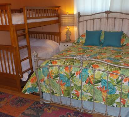 Third Bedroom having a Queen Bed and a Set of Full-over-Full Bunk Beds