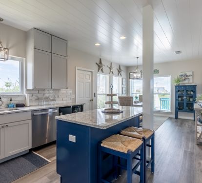 Kitchen opens to dining/living area