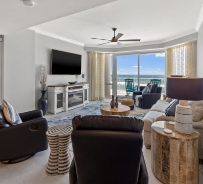 Living room with large TV &amp; fireplace