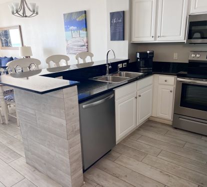 Stainless steel appliances and fully stocked kitchen for easy meals!