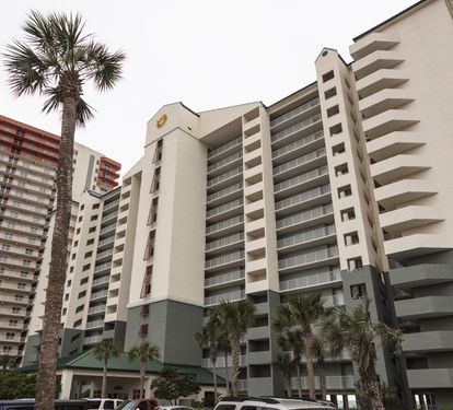 Front of condo with large ground floor parking area no parking decks here!