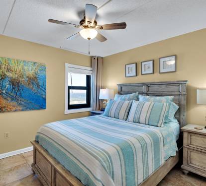 Queen bedroom has view of the beach.