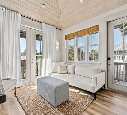 Carriage house living room area, just off the bedroom, with a fold out sofa
