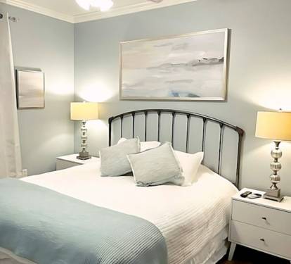 Cozy guest bedroom with king bed.