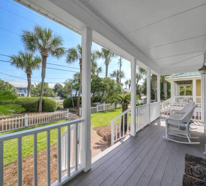 Enjoy time on the large front porch, the ocean is just across the street.