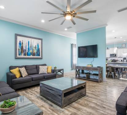 Generous living room offers three full size couches