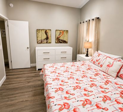 Main bedroom King bed with bathroom and a walk-in shower 