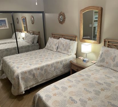 Bedroom 3 with two full beds.