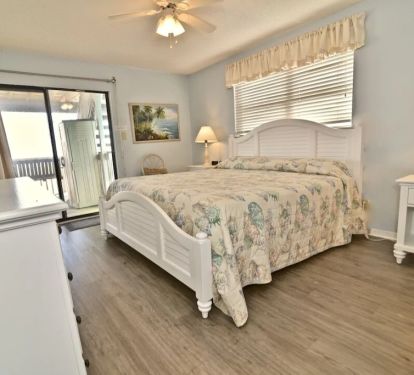 Master Bedroom with sliding doors to porch.