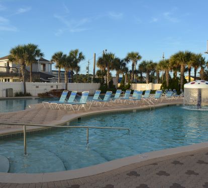 The outdoor pool with waterfalls, kiddie pools and a side cafe.